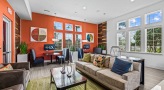 Resident Lounge with comfortable seating and lots of natural light