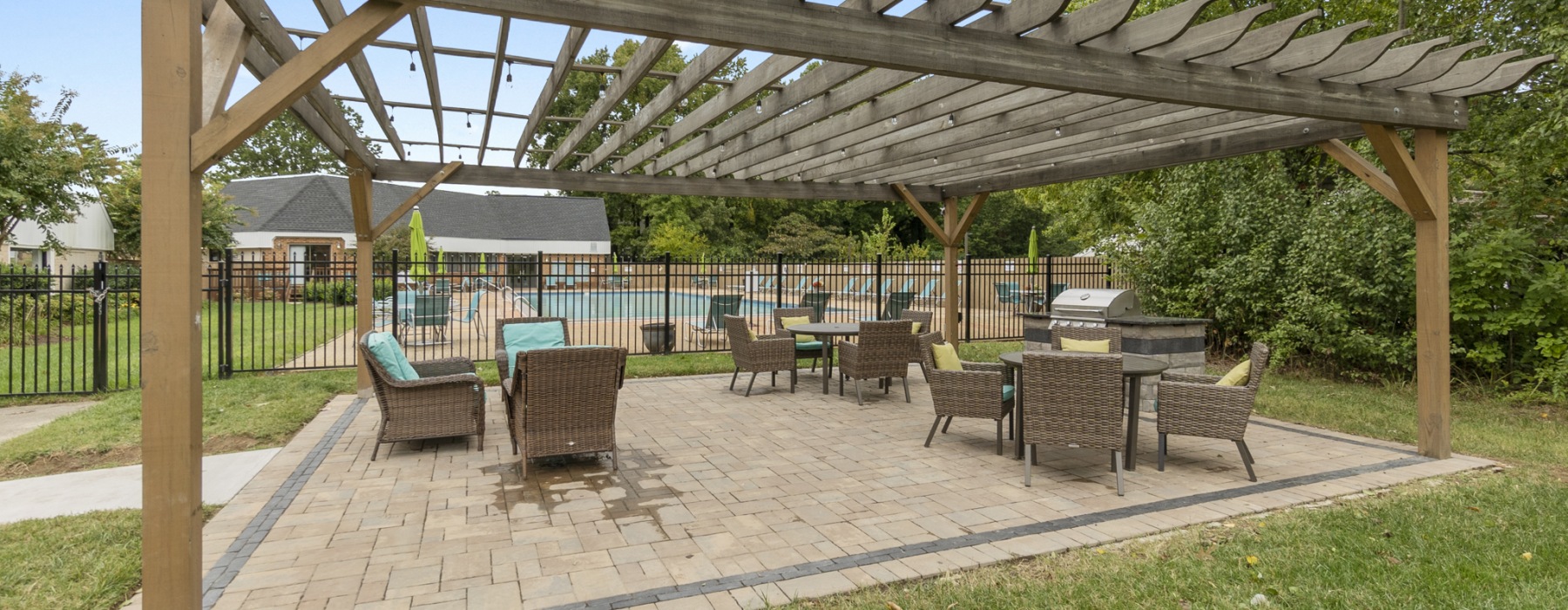 Pergola by the pool with ample seating