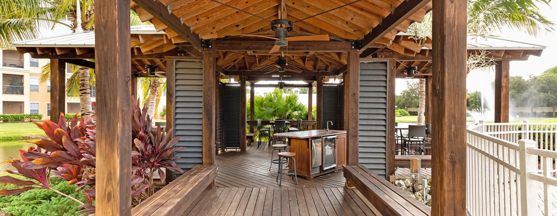 a deck with a table and chairs