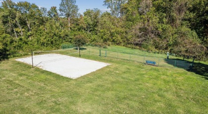 Sand Volleyball court and  fenced in dog park