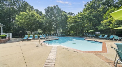Free-form swimming pool with sundeck