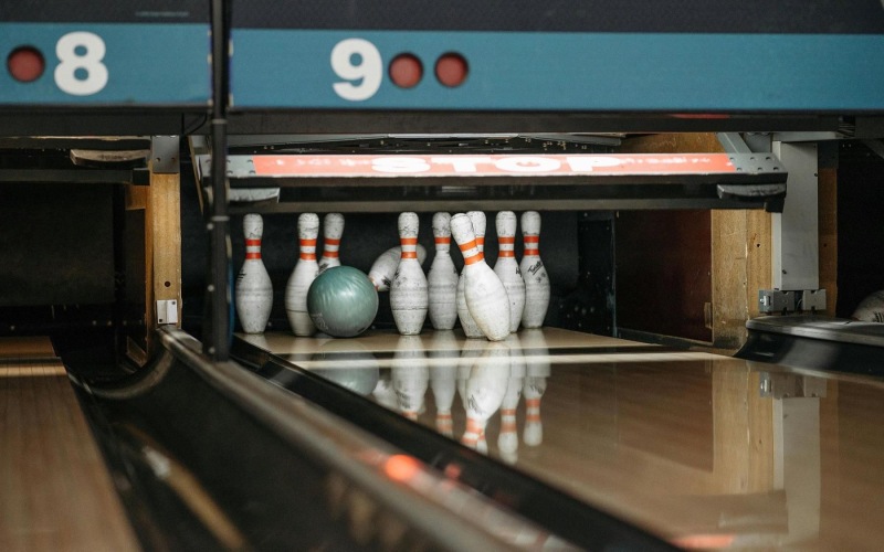 bowling pins getting knocked over