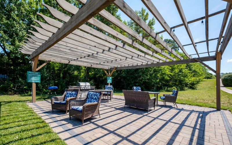 Grilling area with seating and pergola