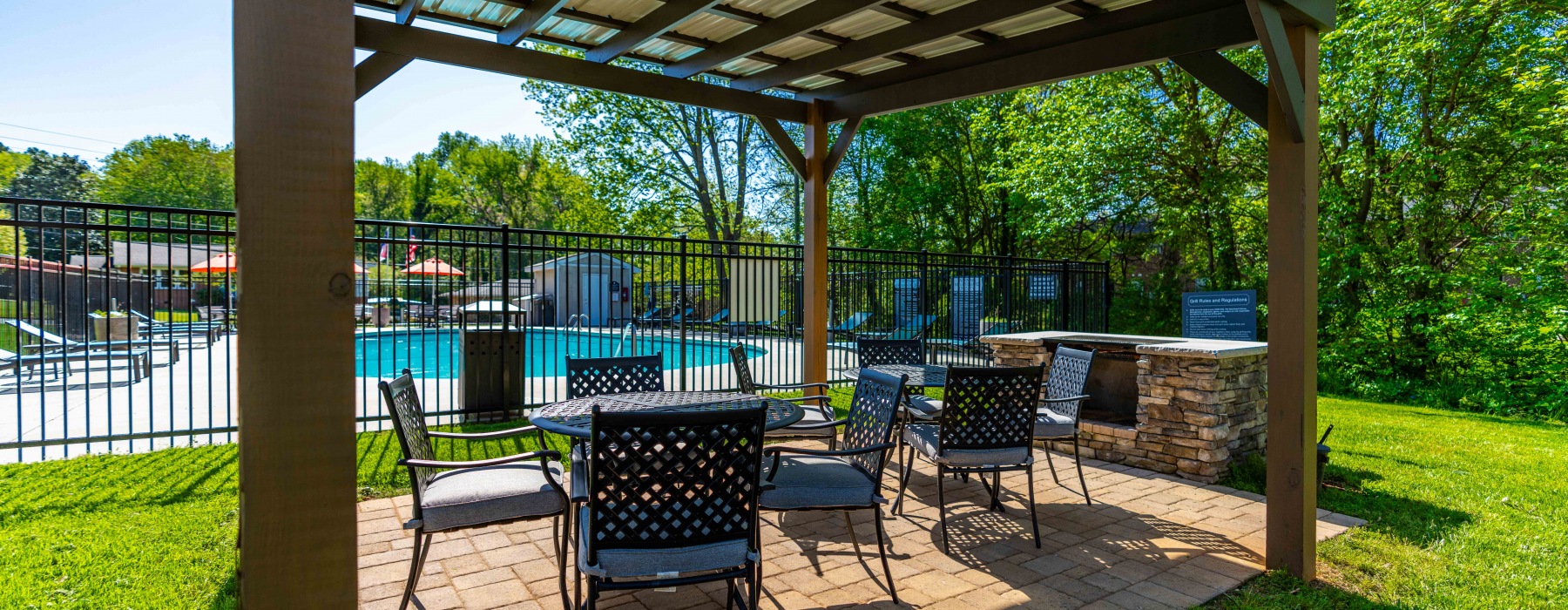 Pergola by the pool with ample seating