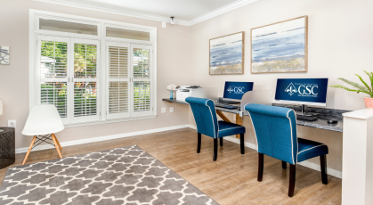 Resident business center with desktop computers and Wi-Fi