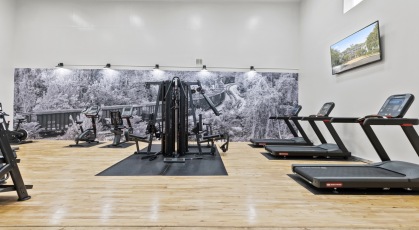 Newly renovated dynamic fitness center with sauna and racquetball court