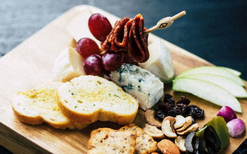 a plate of food, charcuterie board