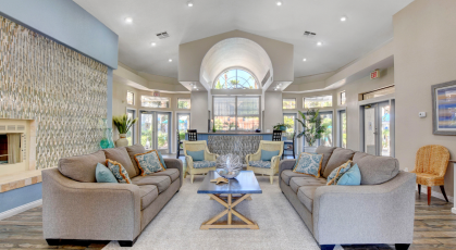 Spacious clubhouse with fireplace, vaulted ceilings and kitchen