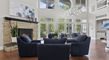 Leasing office and Clubhouse at Old Buckingham Station  with comfortable seating and fire place