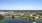 Serene lakeside walking trail around community lake