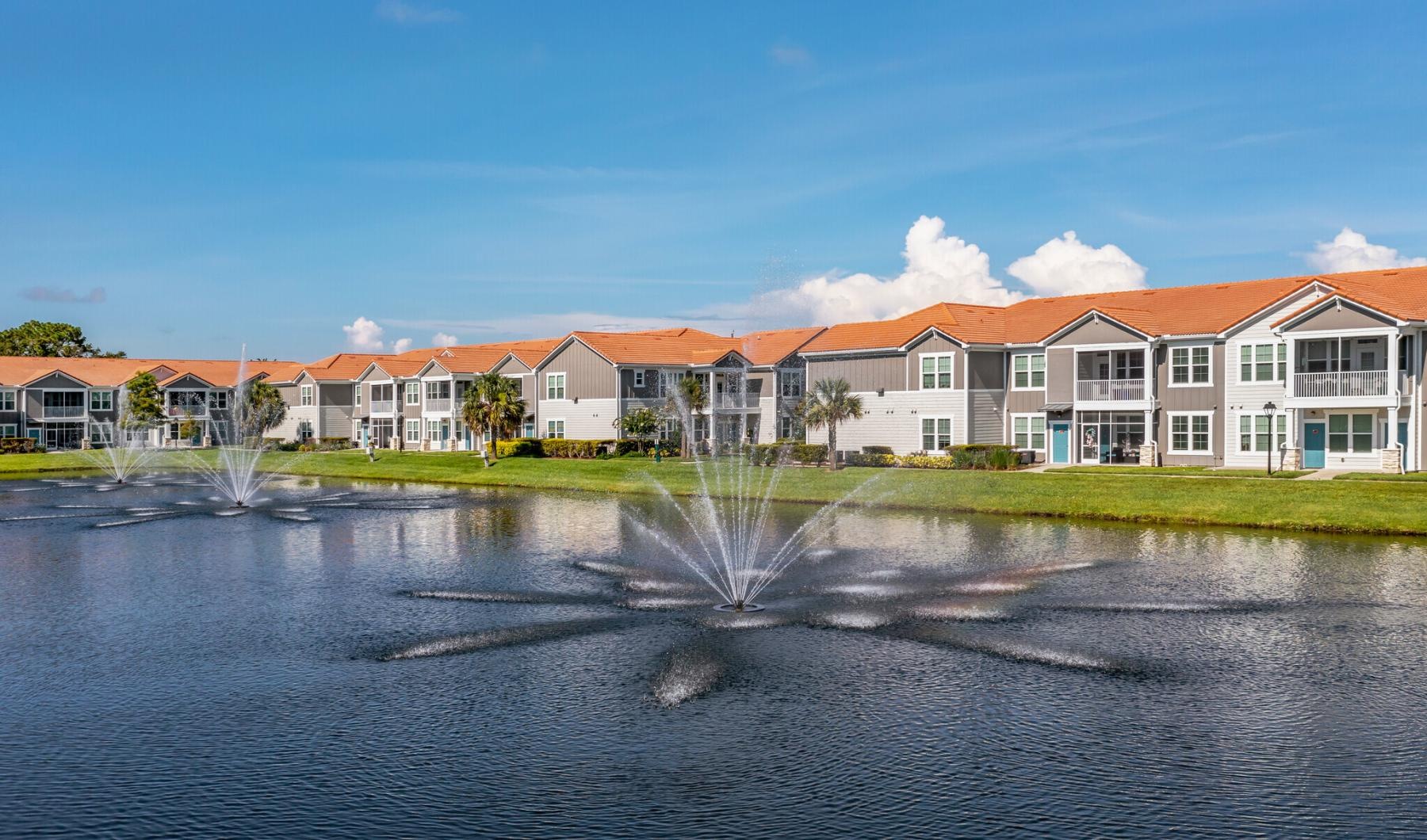 a body of water with houses along it