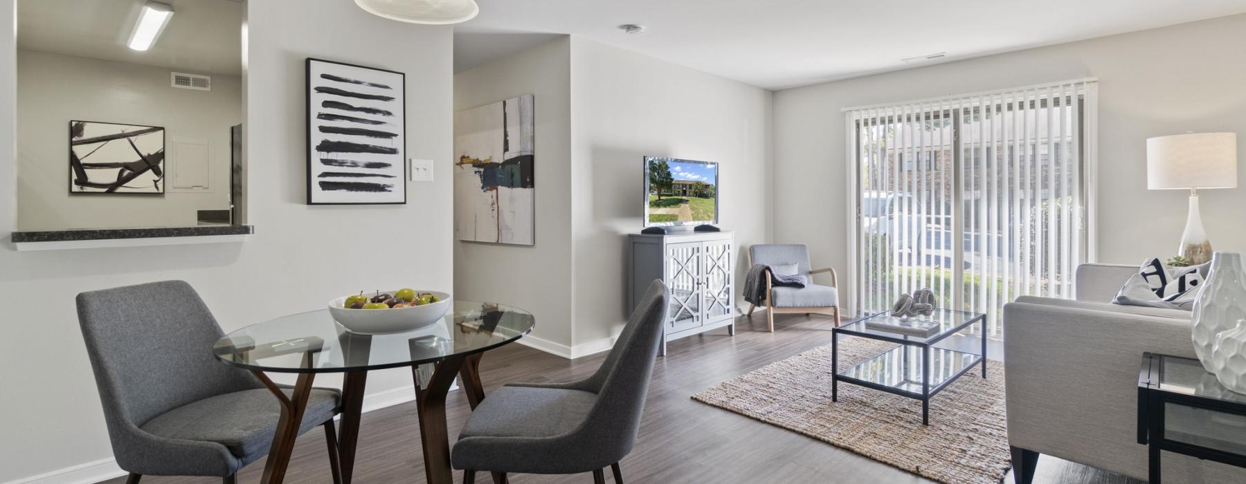 a living room with a dining table