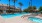 Jacuzzi next to swimming pool 