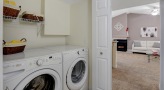 Laundry room with full-size washer and dryer