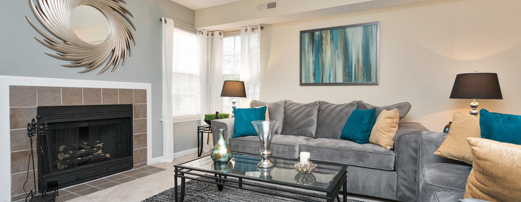 a living room with a fireplace