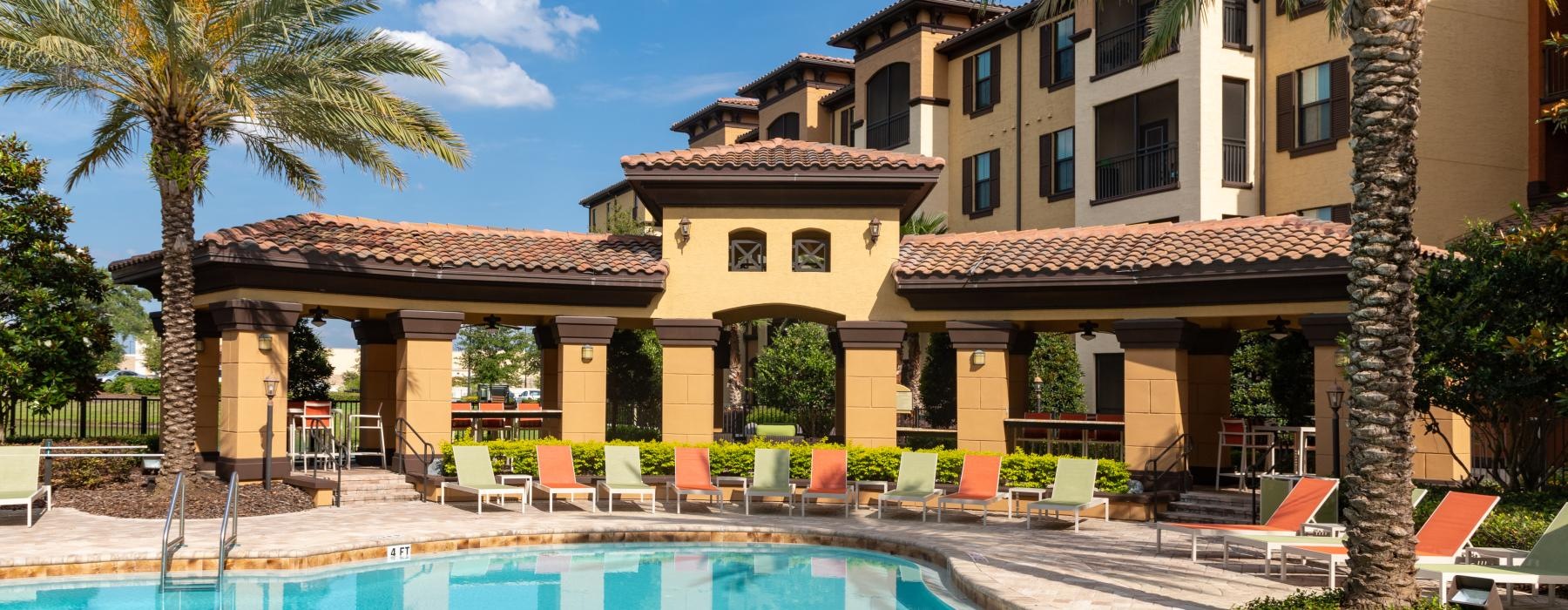 a pool in front of a building