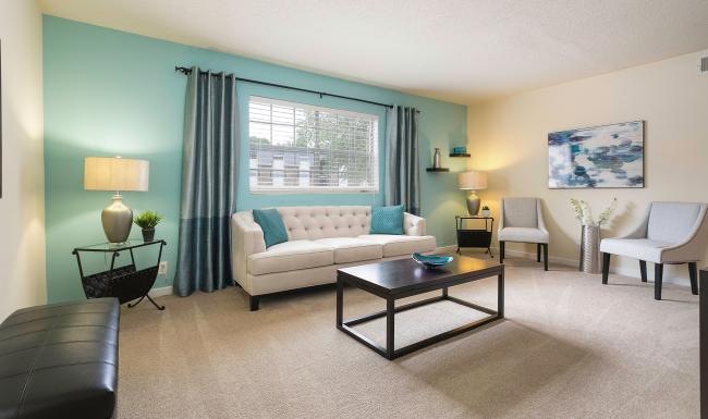 a living room with a couch and a coffee table