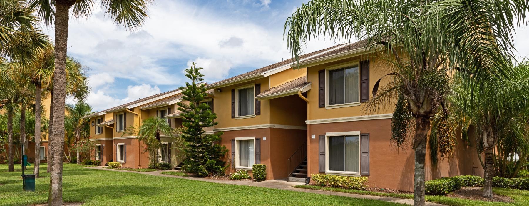 a building with palm trees