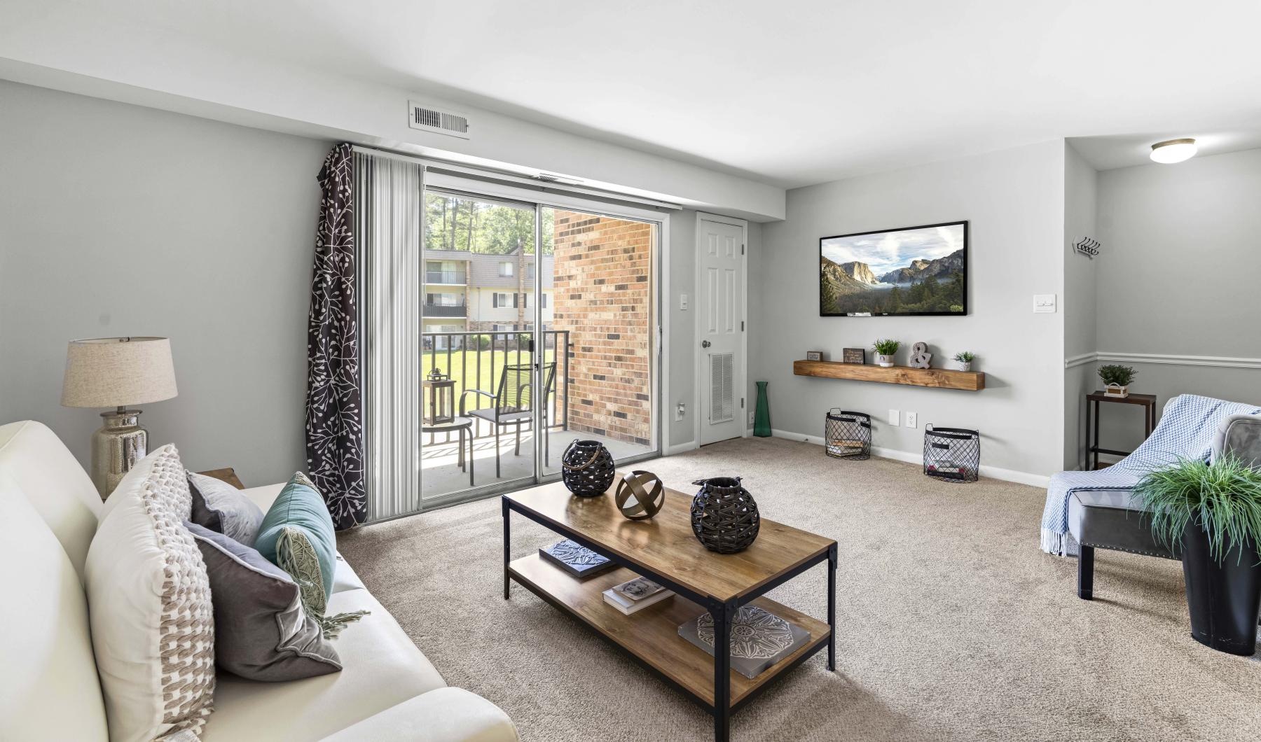 a living room with a couch and a tv
