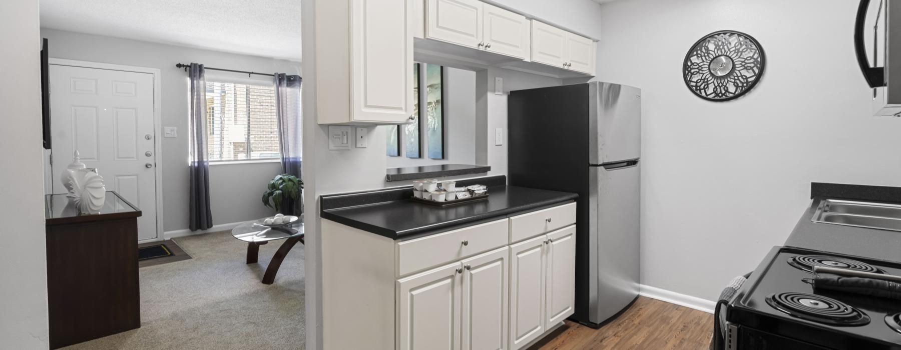 a kitchen with serving counter