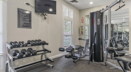 Fitness Center with treadmills and free weights 