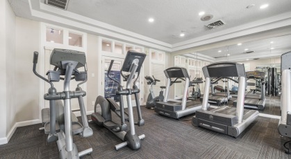 Fitness Center with treadmills and free weights 