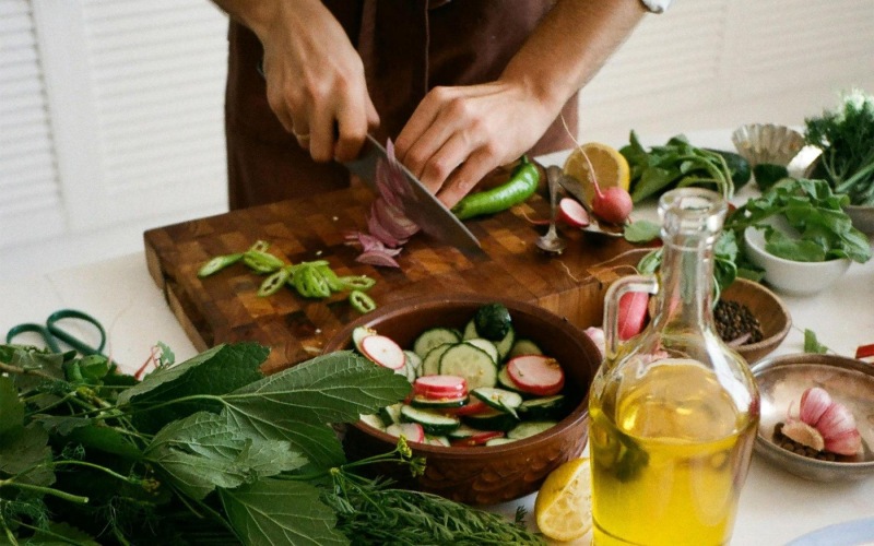a person cutting vegetables