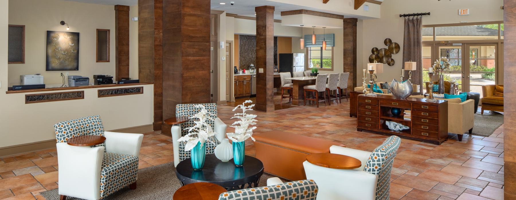 a large room with a table and chairs