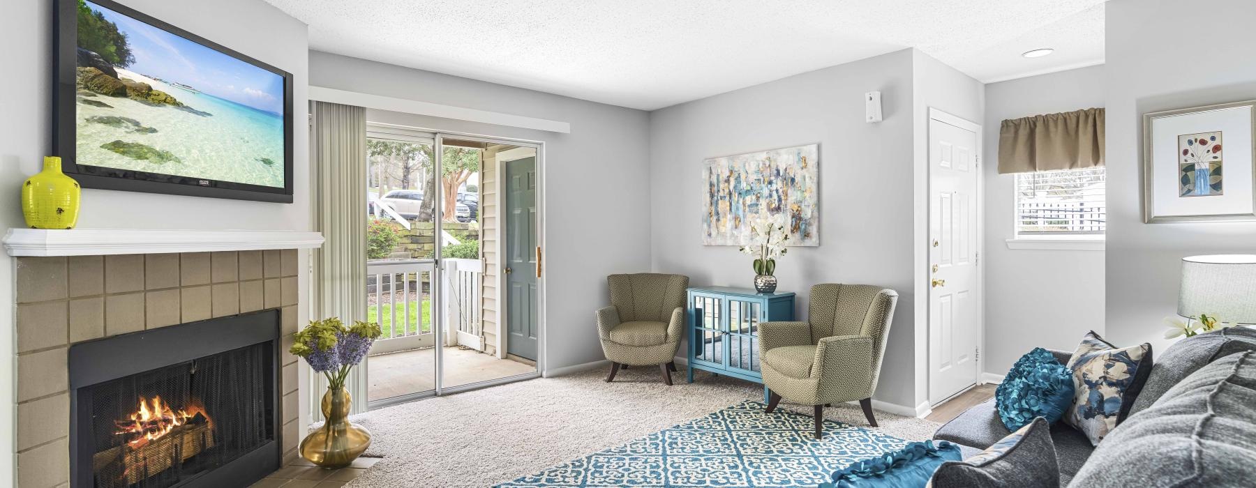 a living room with a fireplace
