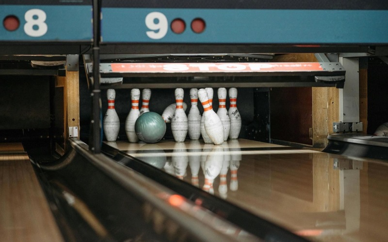 bowling pins getting knocked over