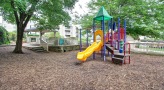 Playground with slides and climbing equipment and picnic area