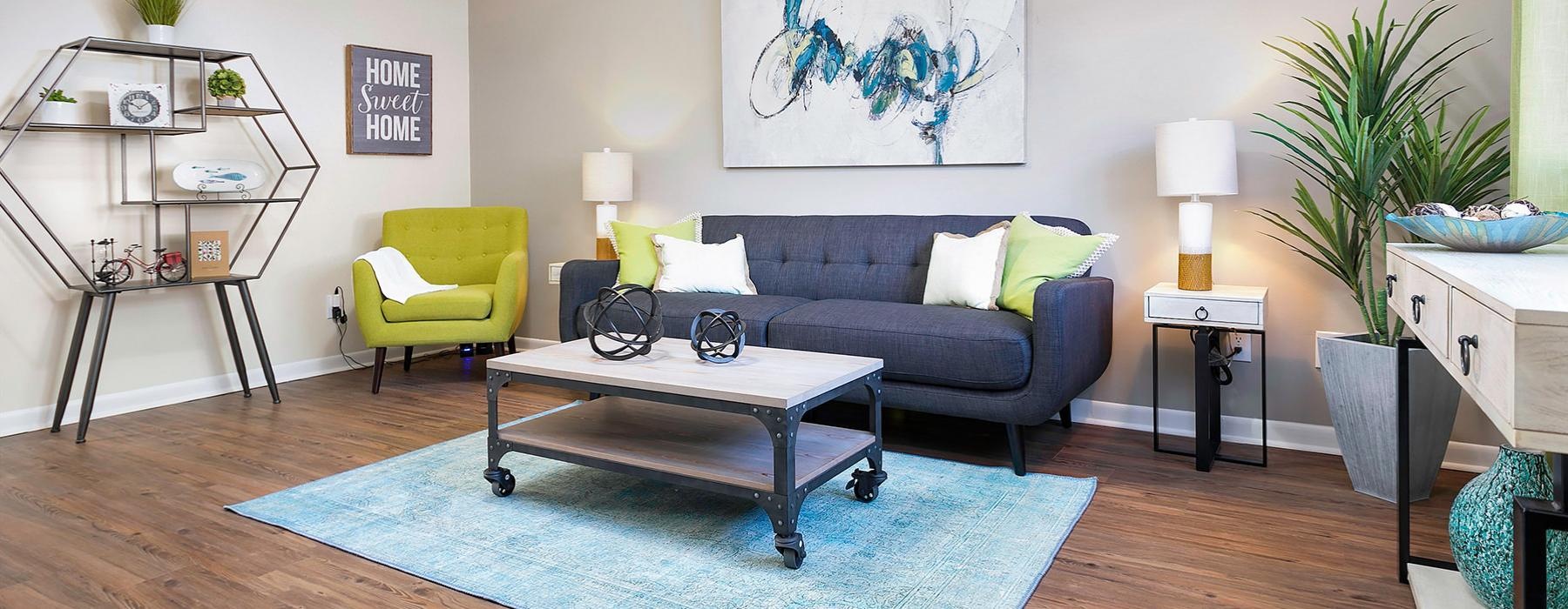 a living room with a couch and coffee table