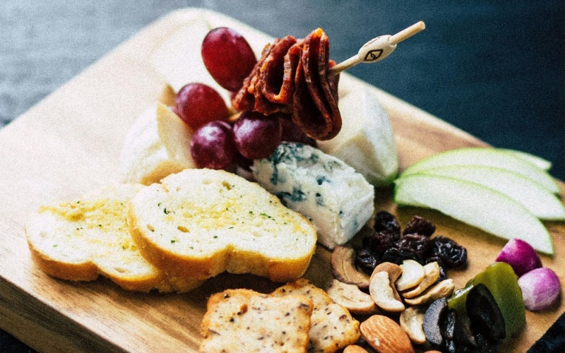 a plate of food, charcuterie board