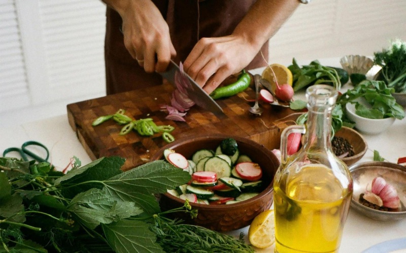 a person cutting vegetables