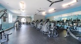 Comprehensive on-site gym fully equipped with treadmills and strength-training free weights