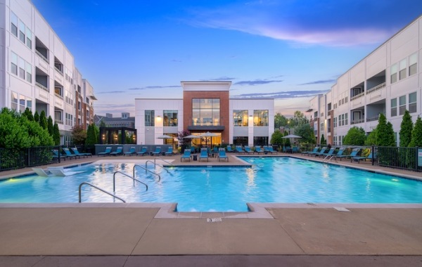 Large sparkling blue swimming pool 