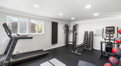 Fitness Center with treadmills and free weights 