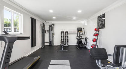 Fitness Center with treadmills and free weights 