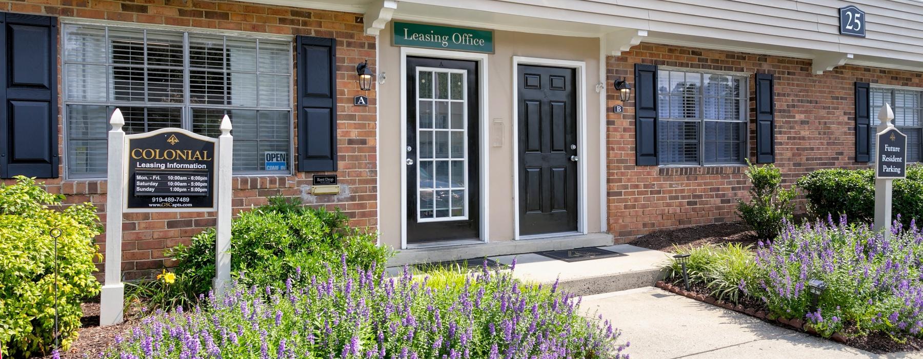 a building with a sign in front