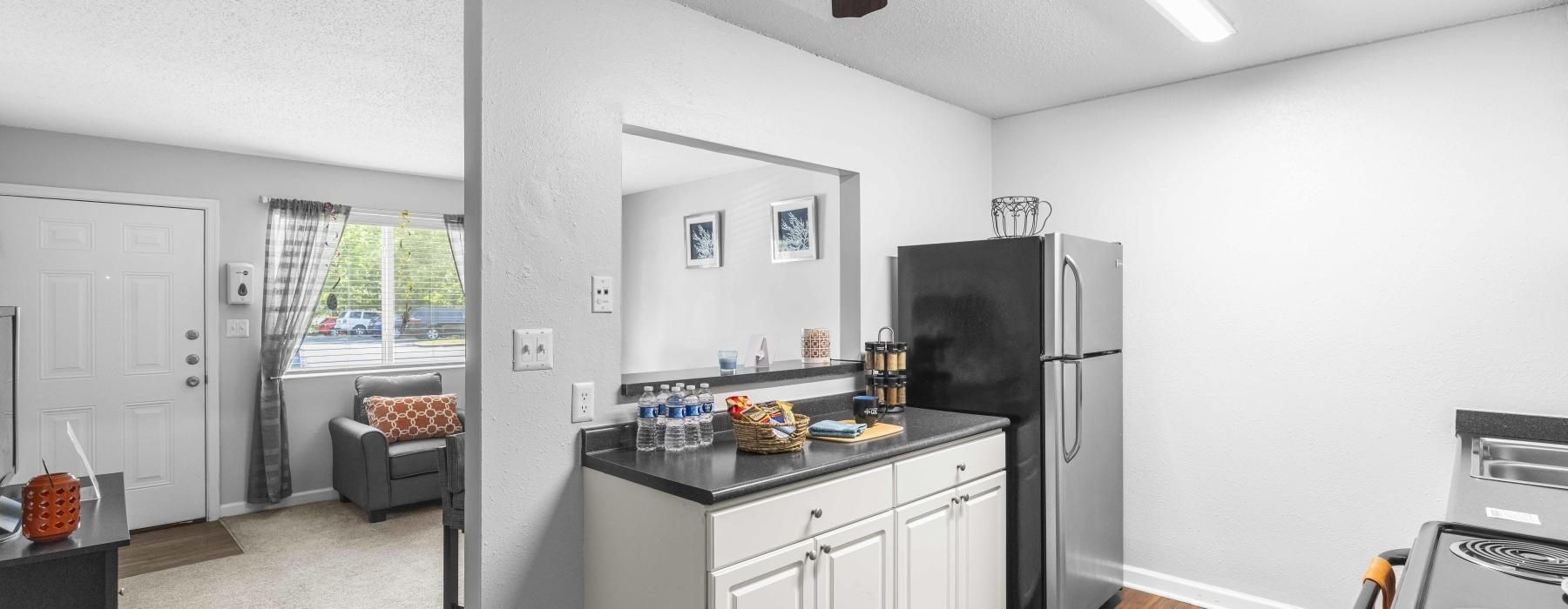 a kitchen with a large fan