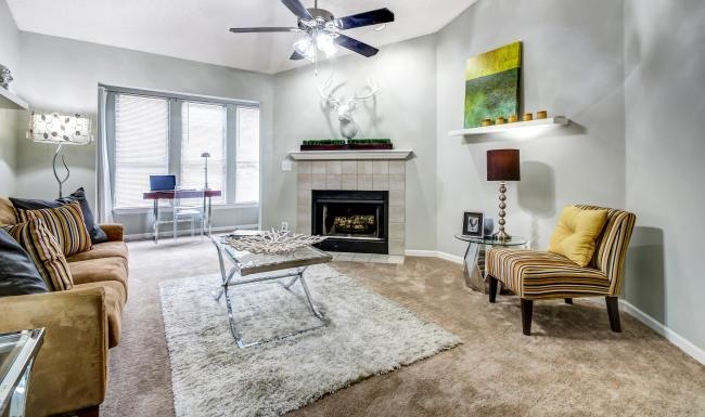 a living room with a fireplace