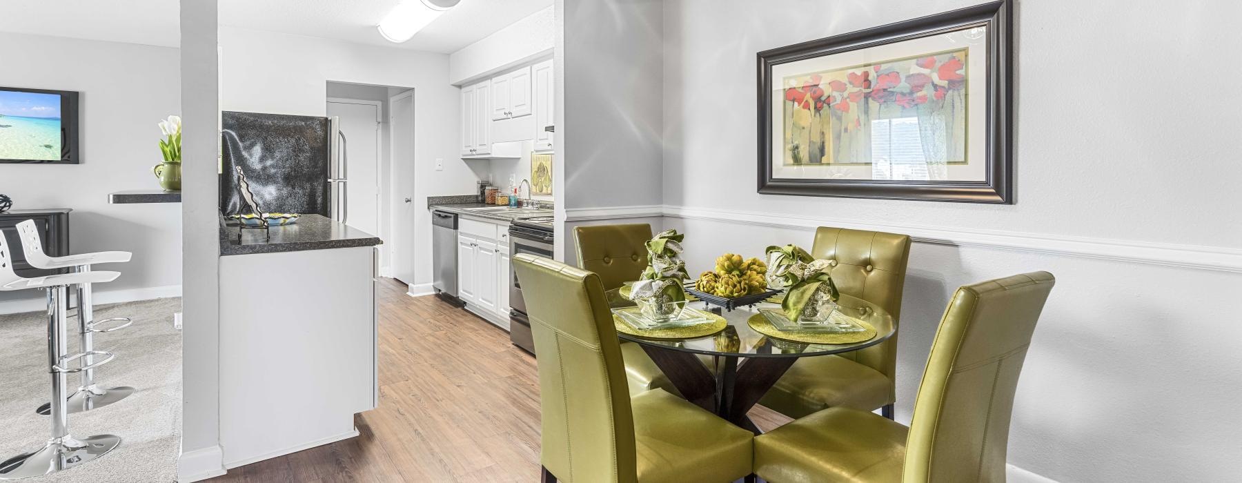 a dining room with a ceiling fan