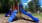 Playground with slide, ladder, and jungle gym