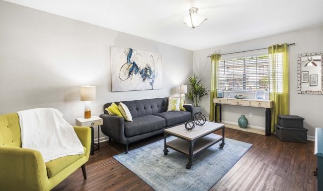 a living room with a couch and a coffee table