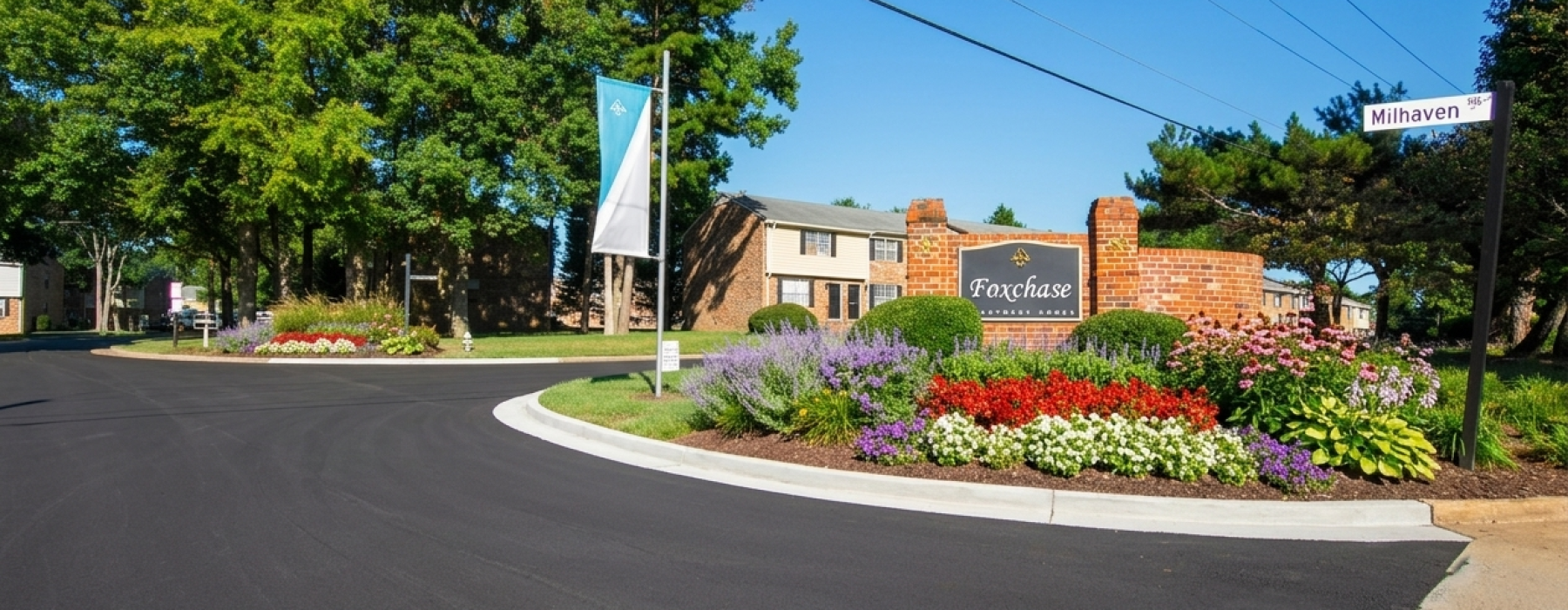 Property sign at entry driveway