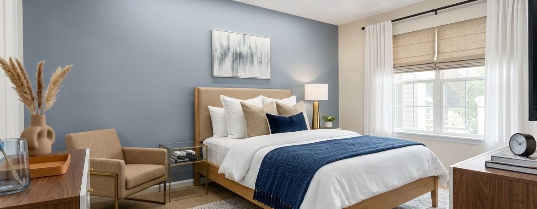 Bedroom with a large window for natural light