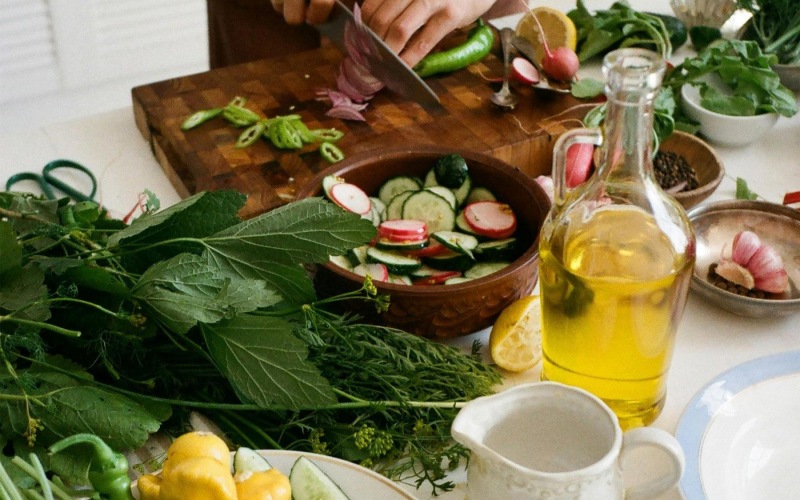 a person cutting vegetables