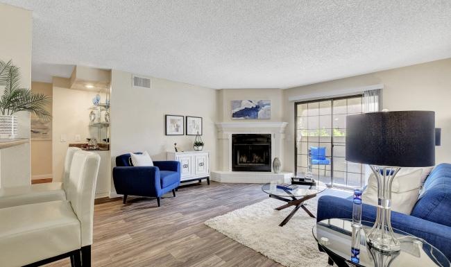 a living room with a fireplace