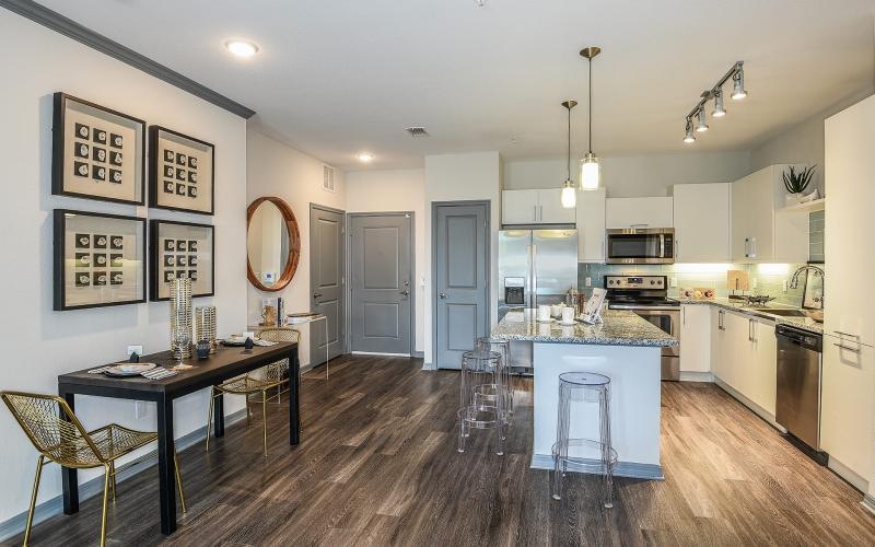 a kitchen with a wood floor