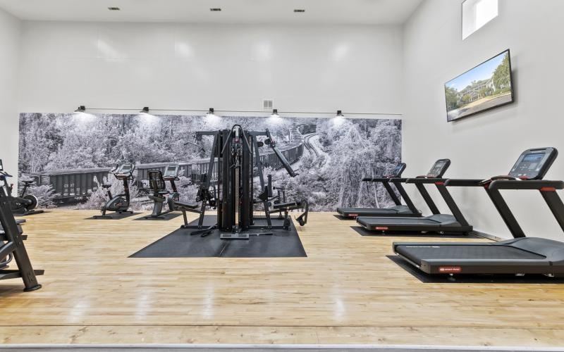 a room with a large painting on the wall